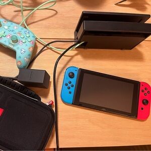 Nintendo Switch Console with Red and Blue Joy-Con